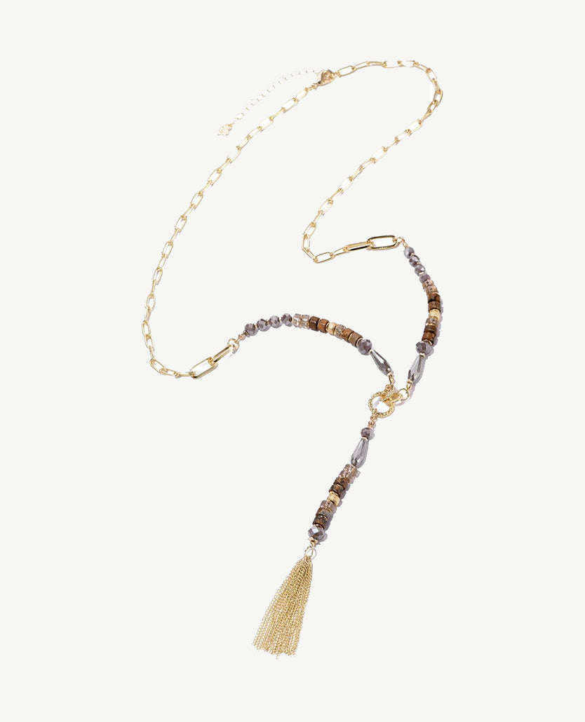 Lange ketting - Goudkleurig met beige en taupe en kwastje
